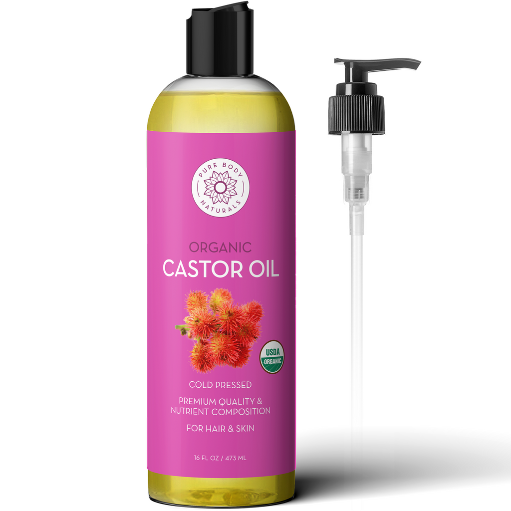 Bottle of organic castor oil with a pump on a white background