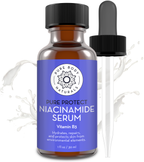 A brown glass bottle labeled "Vitamin B3 Serum" with a black dropper cap next to it. The label indicates the serum hydrates, repairs, and protects skin. The background features splashes of a liquid substance.