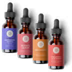 Four bottles of skincare serums with droppers on a white background