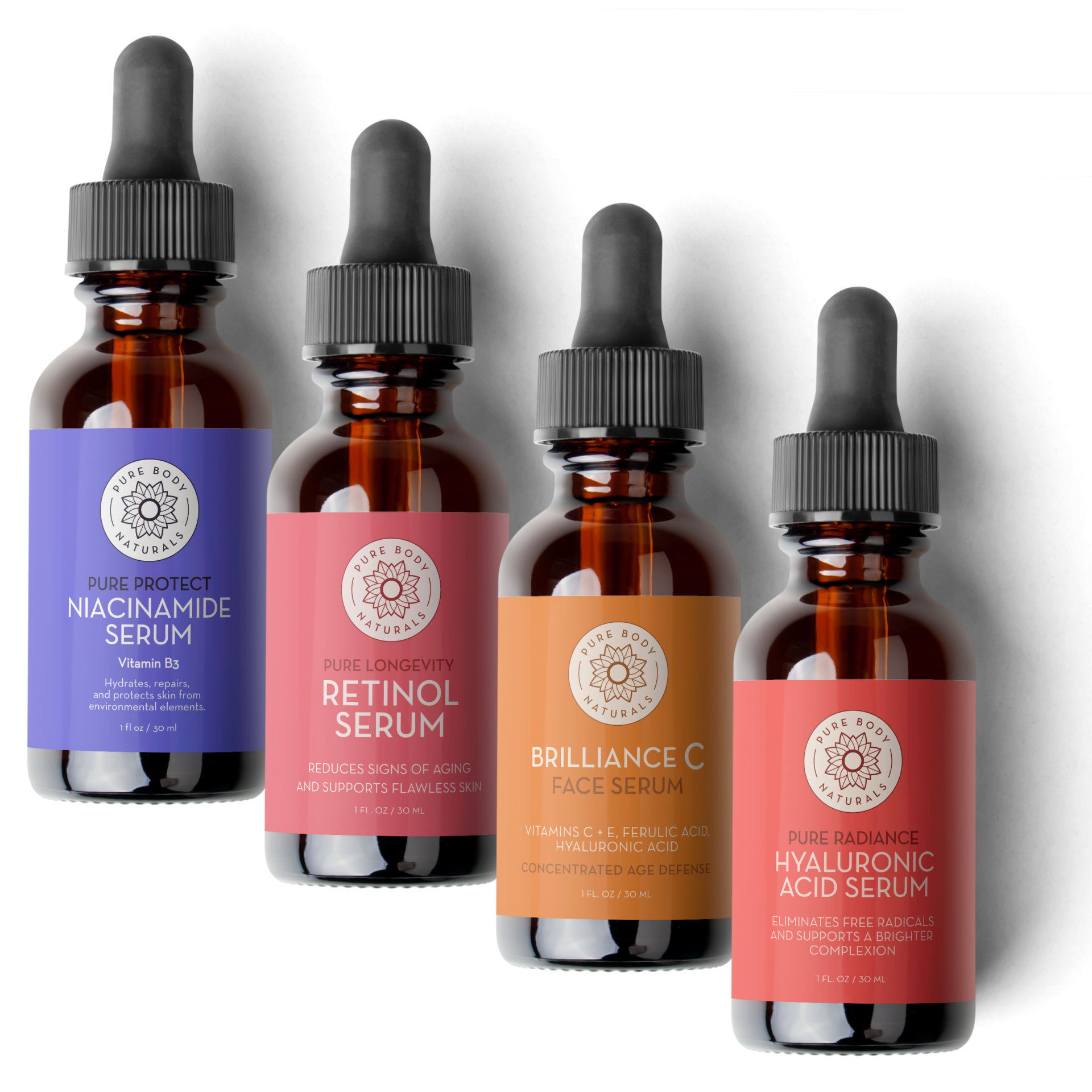Four bottles of skincare serums with droppers on a white background