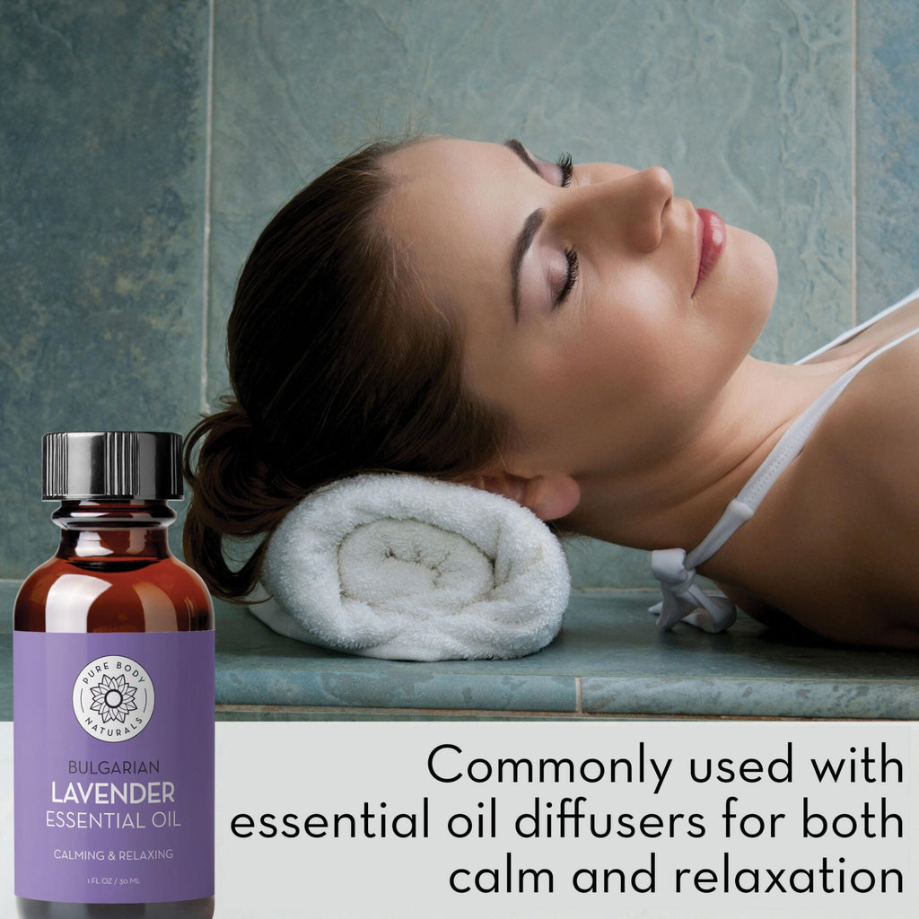 Woman relaxing with a bottle of Bulgarian Lavender Essential Oil in a spa setting.