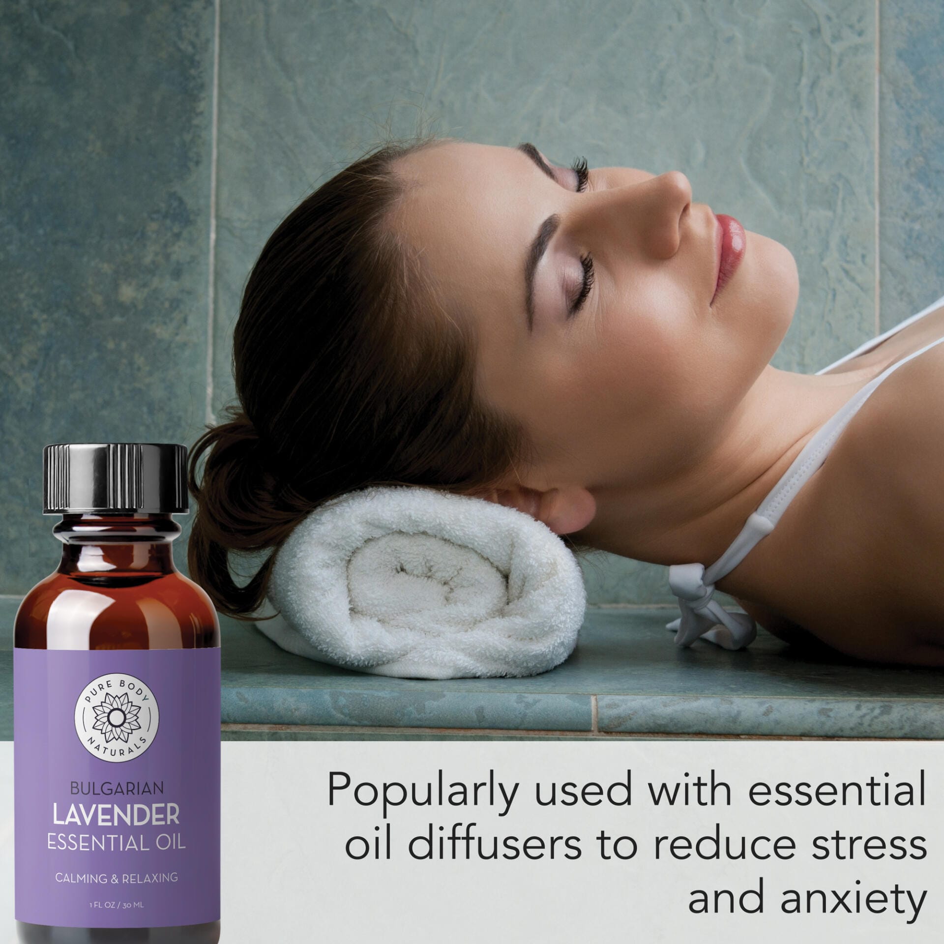 woman resting head on towel with bulgarian lavender bottle