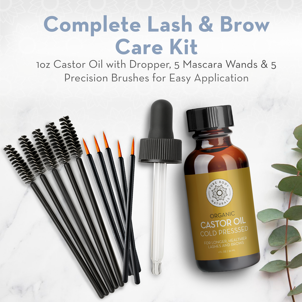 Complete lash and brow care kit with organic castor oil bottle, dropper, mascara wands, and precision brushes.