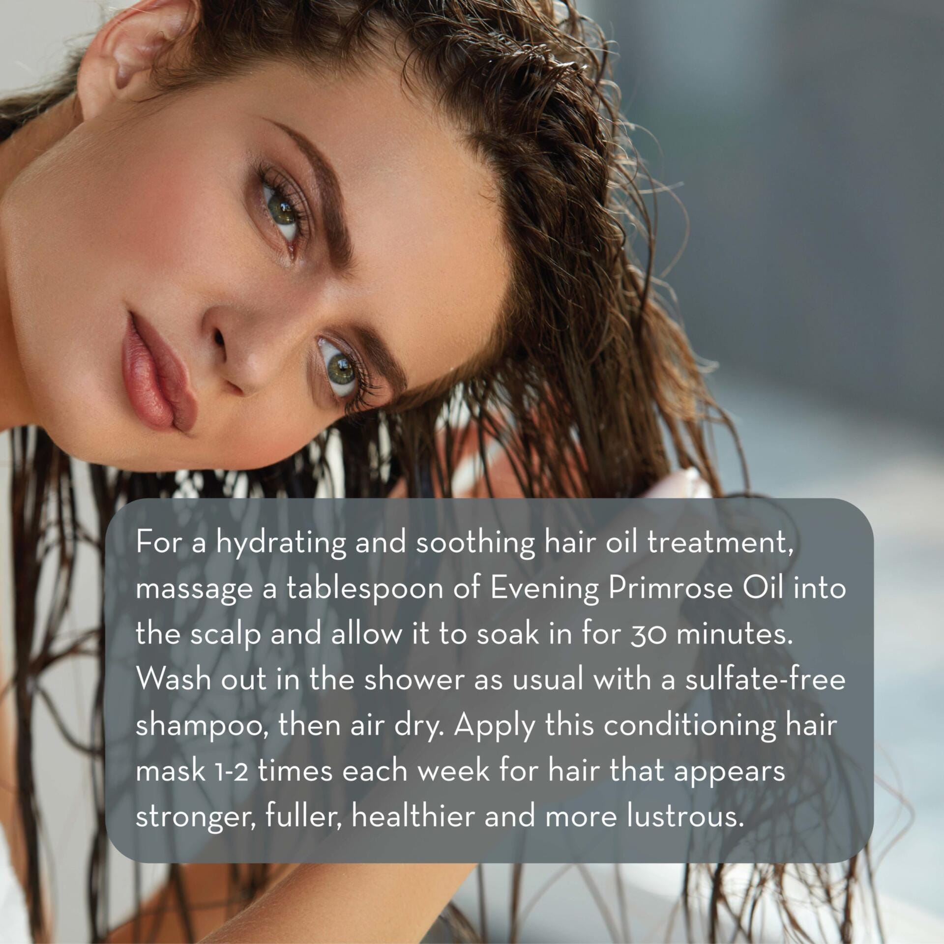 A woman with long, brunette hair is spotlighted. She gazes subtly towards the camera while running her fingers through her damp hair. A text overlay provides a recipe for a hydrating hair oil treatment featuring Evening Primrose Oil, 4 fl oz and a sulfate-free shampoo.