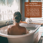 Person taking a bath with a text overlay about Pure Body Naturals Tea Tree Foot Scrub.