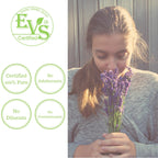 Woman smelling lavender with EVS Certified logo and certification details on a white background