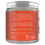 A jar labeled "Bentonite Indian Healing Clay, 100% Pure" with a red label outlining directions for use and product details. The label indicates it's a bentonite clay mask made in the USA, not tested on animals. The brand is based in Cincinnati, Ohio.