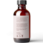 A brown bottle with a black cap, labeled "Rosehip Seed Oil, 4 fl oz." The back of the bottle features text detailing the benefits of the oil, such as hydration, repair of damaged skin, and effectiveness on blemishes, scars, wrinkles, and scalp health.