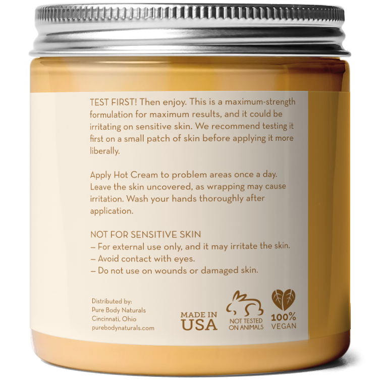 A brown jar with a silver lid, labeled with product instructions and information. The text advises testing the Maximum Strength Hot Cream on a small skin patch first, applying to problem areas, avoiding eyes, and not using on sensitive or damaged skin. The jar is made in the USA and 100% vegan.