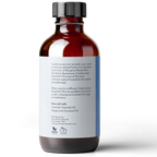 A brown glass bottle with a white label displays text describing Frankincense Essential Oil, 4 fl oz by Pure Body Naturals. The label includes usage information, pairing suggestions with Lavender and Peppermint oils, and distribution details from Cincinnati, Ohio.