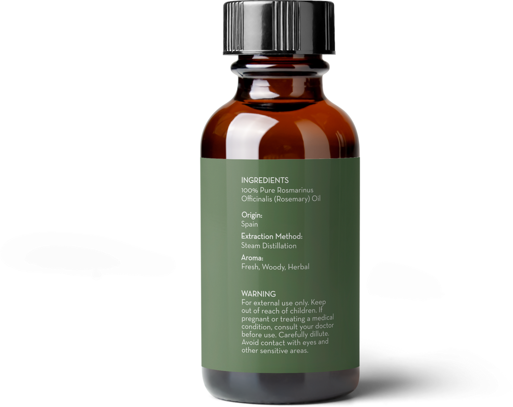 A brown glass bottle with a black cap, containing Rosemary Essential Oil. The green label lists ingredients, origin (Spain), extraction method (steam distillation), aroma (fresh, woody, herbal), and a warning for external use only.