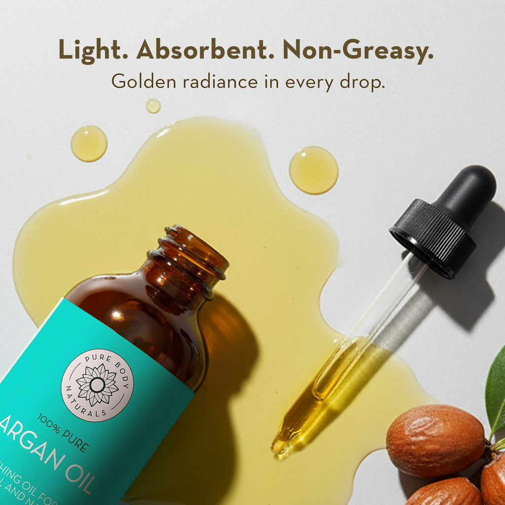 Argan oil bottle with dropper and oil droplets on a light background