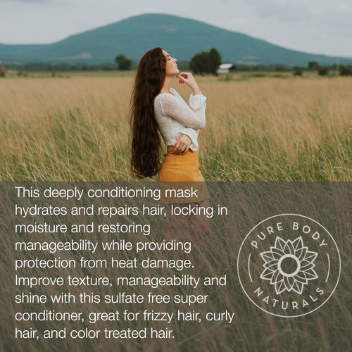 A woman standing in a grassy field with mountains in the background. She has long, wavy hair and is wearing a white shirt and yellow skirt. There's text about a Coconut Oil Intensive Repair Hair Mask, highlighting its benefits for various hair types.