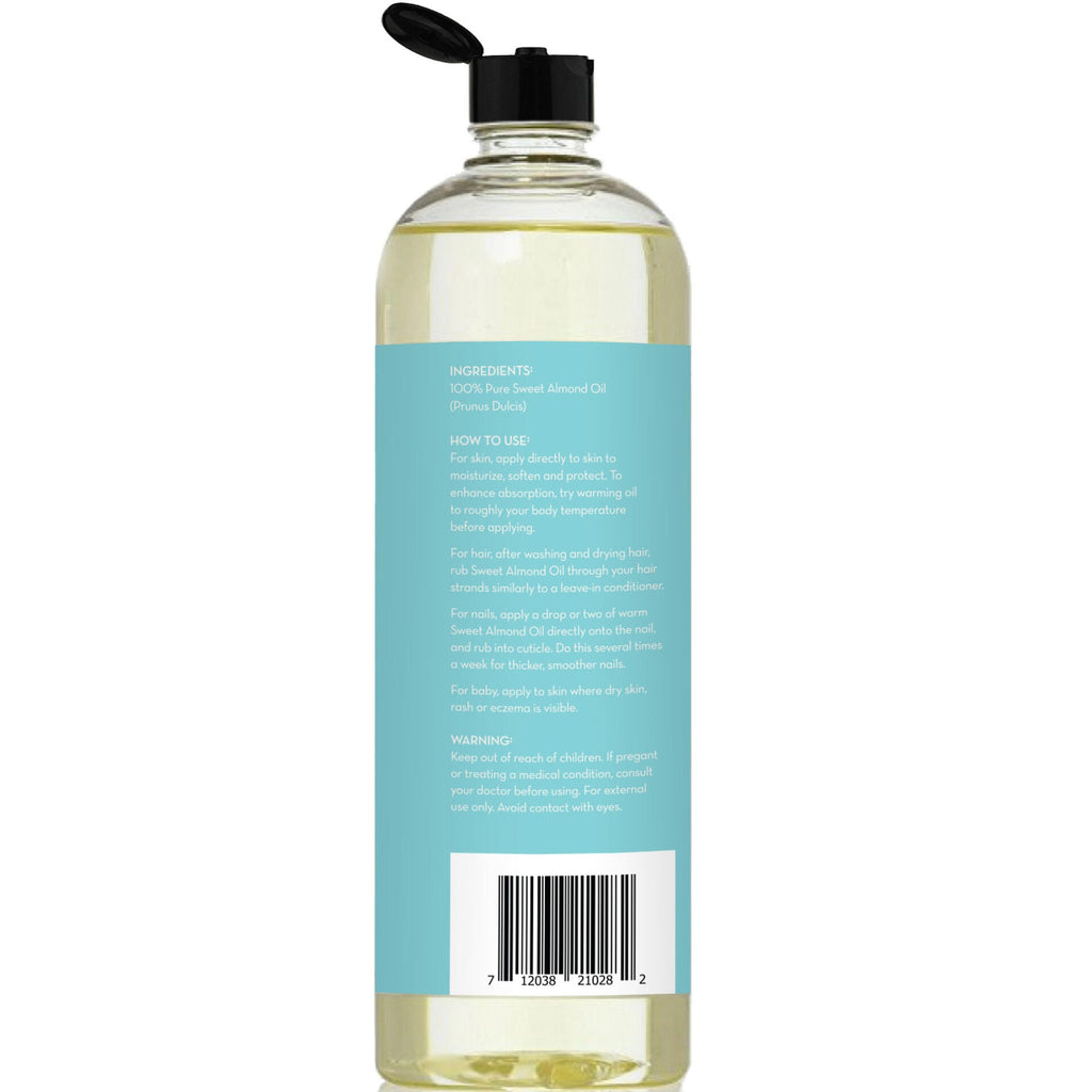 A tall, cylindrical bottle of Cold Pressed Sweet Almond Oil with a black flip-top cap. The label is light blue and includes ingredient information, usage instructions, and a barcode at the bottom. The bottle contains 16 fl oz (473 ml) of Cold Pressed Sweet Almond Oil.