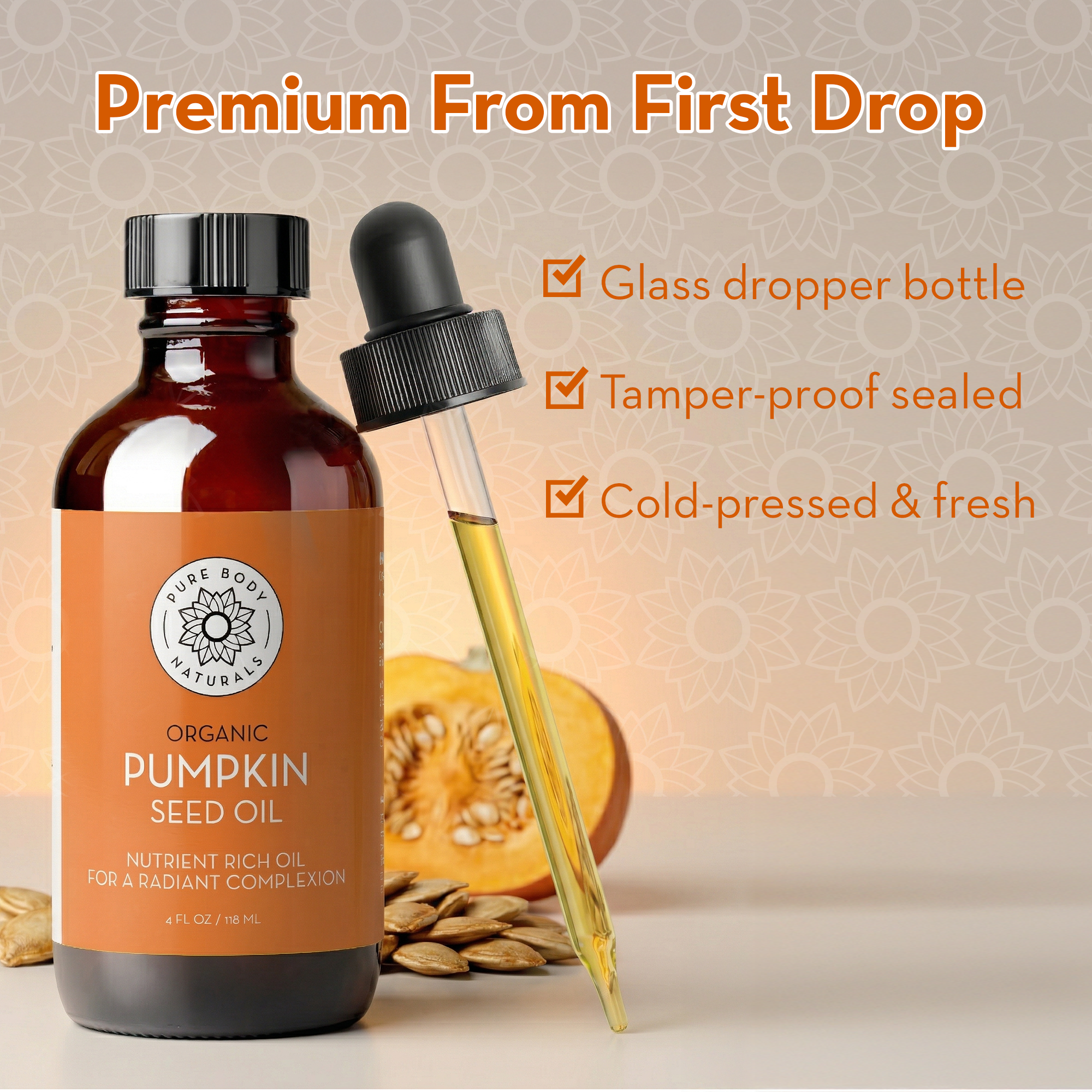Bottle of pumpkin seed oil with a dropper on a textured background