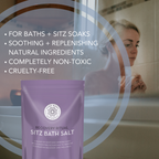 An image shows a woman relaxing in a bathtub with a package of "Recovery Ritual Sitz Bath Salt, 10 oz" in the foreground. Text on the image highlights bath salt benefits: for baths and sitz soaks, soothing, replenishing, natural ingredients, non-toxic, cruelty-free.