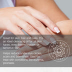 Close-up of a person's hands with well-manicured nails applying Cold Pressed Sweet Almond Oil. Text overlay highlights the product's benefits for skin, hair, and nails, including treating conditions like eczema, psoriasis, and blemishes. Brand logo "Pure Body Naturals" is visible.