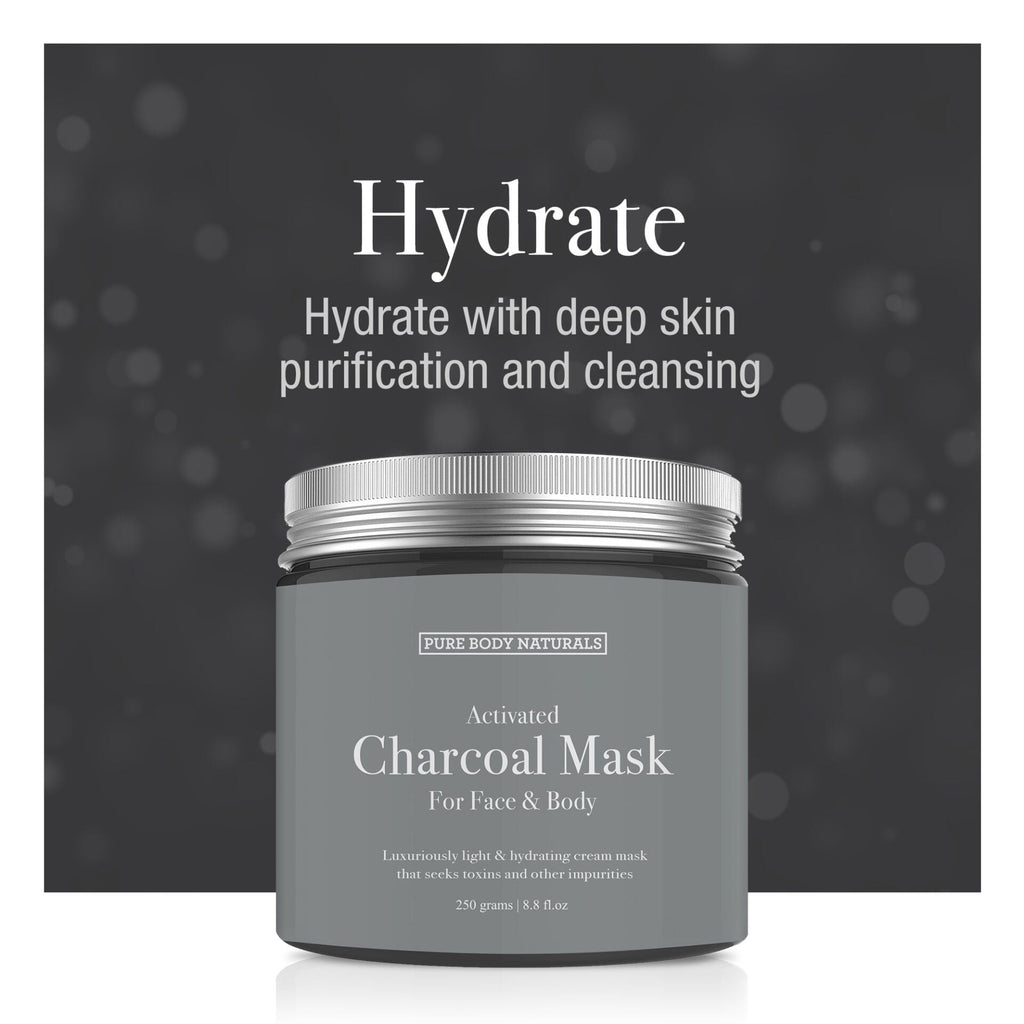 Gray jar of activated charcoal mask with silver lid on a dark background