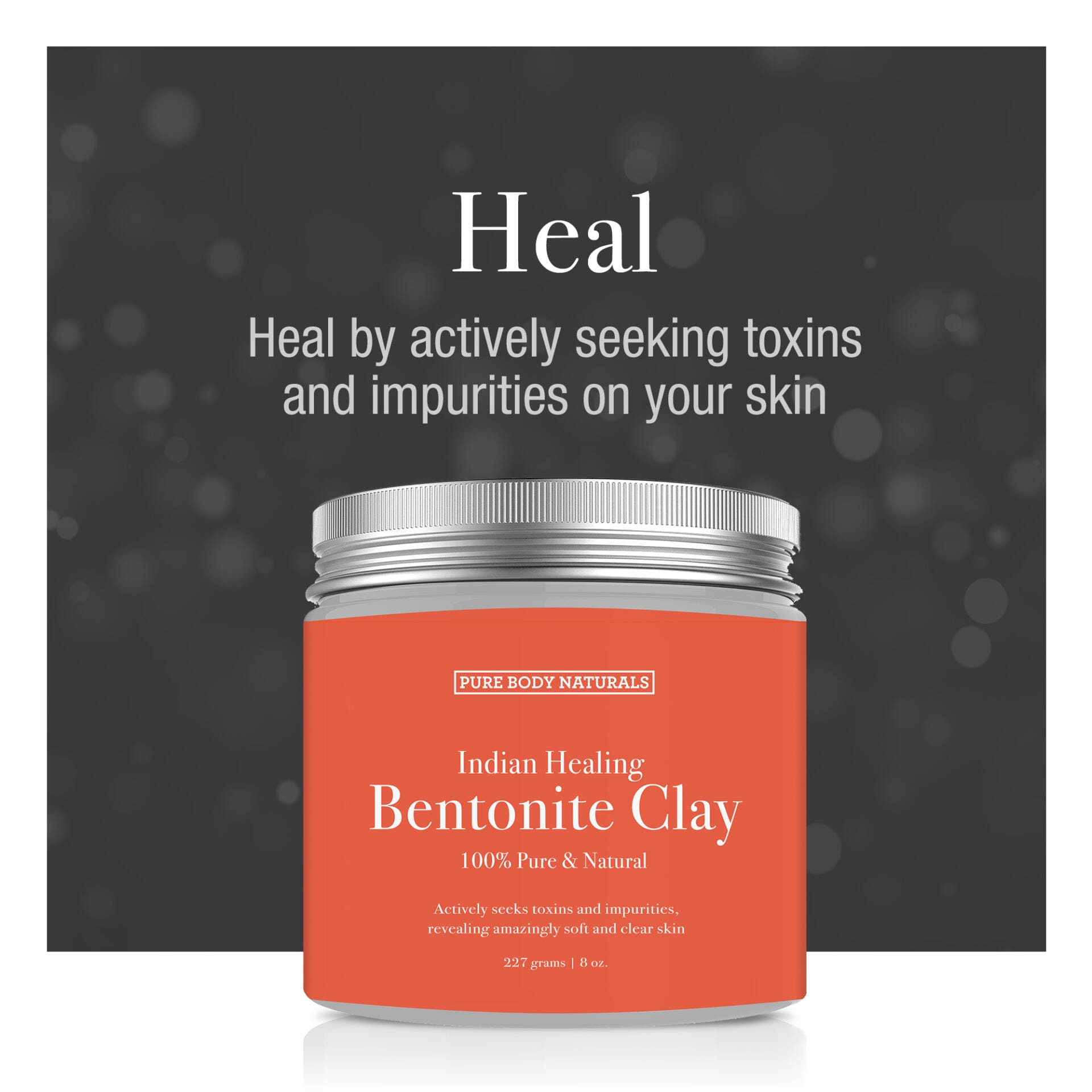Orange jar of Indian Healing Bentonite Clay with silver lid on a dark background